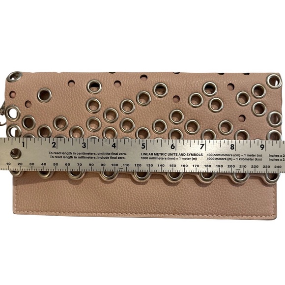 Sondra Roberts Stylish Light Pink Clutch with Grommet Design - Picture 8 of 9